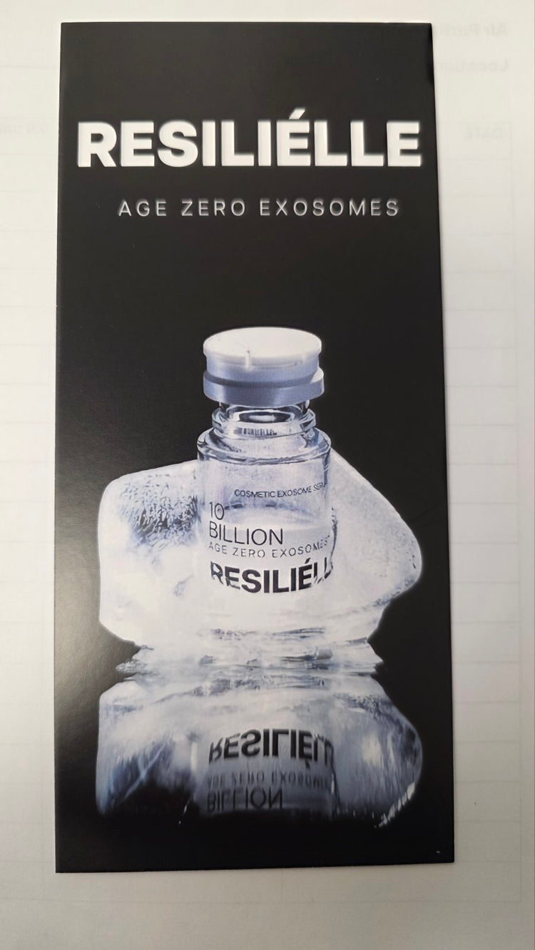 Advertisement for Resilièlle with a bottle on a reflective surface